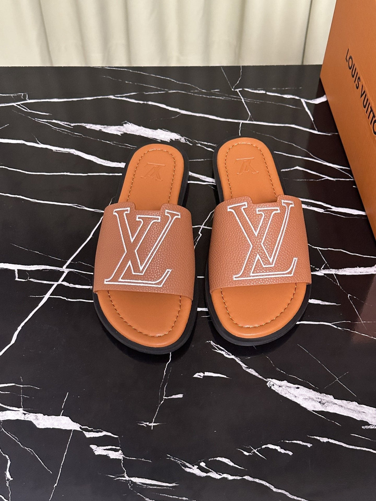 Louis Vuitton Logo Strap Slide Sandals — hero