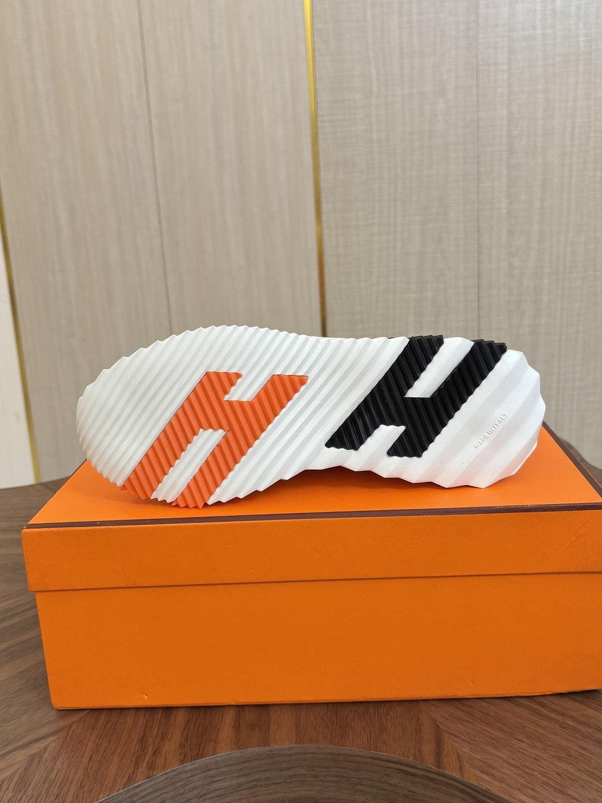 Hermes Black Ribbed Sole Sneakers — side