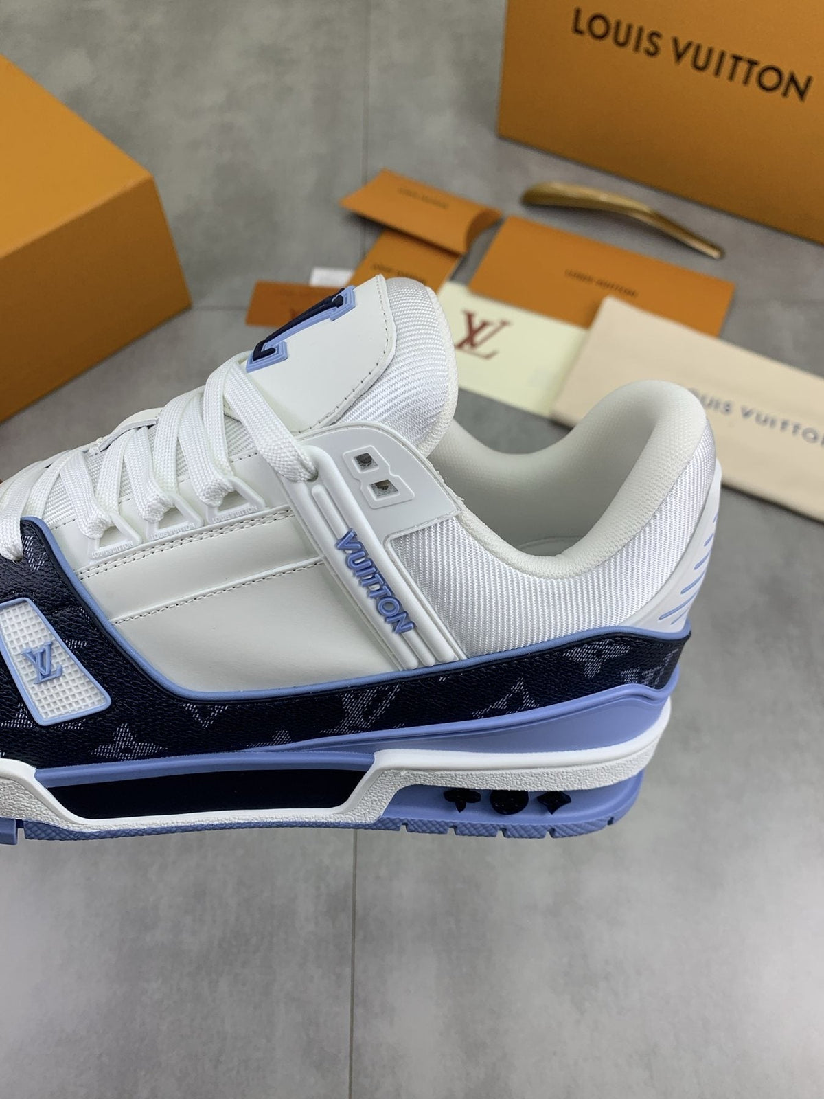 Louis Vuitton White and Navy Blue Sneakers — side